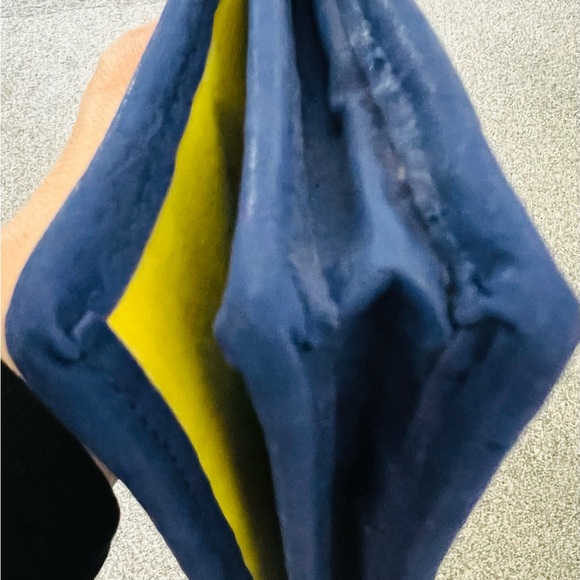 Blue and cream clutch with vibrant yellow interior lining. Button closure - Picture 8 of 8